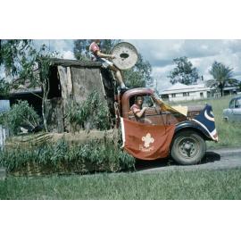 Truck being used as a float for the Rosewood Boy Scouts during procession in Rosewood, Ipswich, 1960s