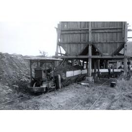 Loading coal from shute at the Caledonian Collliery, Thagoona, Ipswich, 1964