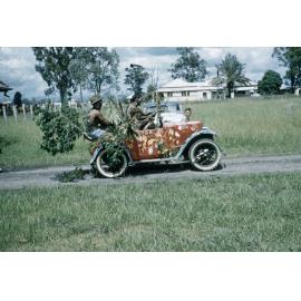 Vehicle being used as a float for a parade in Rosewood, Ipswich, 1960s