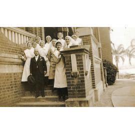 Nurses and unidentified man at Ipswich General Hospital, late 1920s