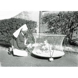 Sister Graham beside the Childrens' Ward, Ipswich General Hospital, n.d.