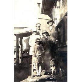 Unidentified family group on steps of home, North Ipswich, early 1930s