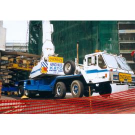 Truck and crane being used during redevelopment of Ipswich General Hospital, Ipswich, 1999