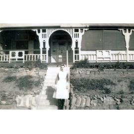 Nurse Ewald in the front of home for Epidemic Ward staff, Ipswich General Hospital, Ipswich, 1940s