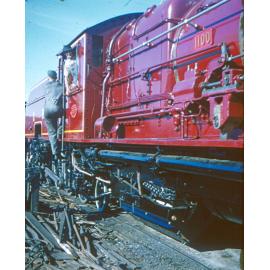 Restoring a Bayer-Garratt locomotive, no. 1100 at the Ipswich Railway Workshops, North Ipswich, 1957