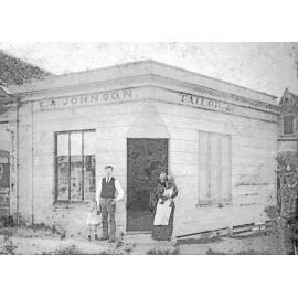 Charles and Mary Johnson, with their children, in front of their tailor shop on Ellenborough Street, Ipswich, 1880s