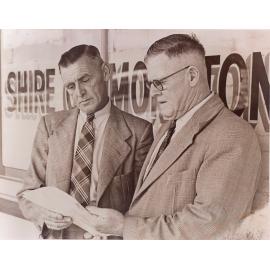 Wilfred Johnston and T. P. Nugent, outside Moreton Shire office, Ipswich, 1949