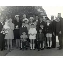 O'Dempsey family at first communion for a member of the family, at St Mary's Catholic Church, Ipswich, c.1969