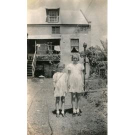 Children in backyard of home, Brisbane Street, West Ipswich, 1950s