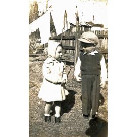 Unidentified children in the backyard of a home at West Ipswich, early 1950s
