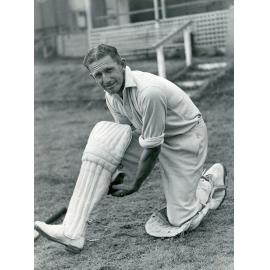 Len Johnson, Ipswich, padding up at East Ipswich Sports Ground after being selected for the Australia v India, 5th Test at Melbourne Cricket Ground, 1947-1948