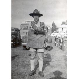 Boy Scout with miners' rescue pack at Booval, Ipswich, in the early 1950s