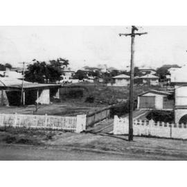 View from 20 Green Street towards bakery ar rear of Booval Motor Bus Company, Booval, early 1960s