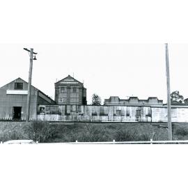 Rear view of the Old Flour Mill, at 231-235 Brisbane Street,  from the railway line, Ipswich, 1940s