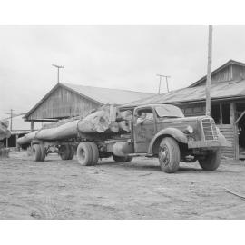 Loaded logging truck at Kruger Sawmill, Byrne Street, Bundamba, Ipswich, 1959