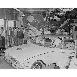 Men looking at  Modern Motors Showroom Ford Falcon display, Brisbane Street, Ipswich, 1960