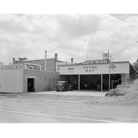 National Tyre Service, fitting bay, 40-42 Brisbane Street, corner of Gordon Street, Ipswich, 1960