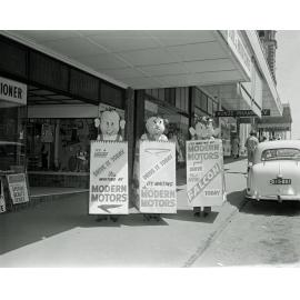 Staff of Modern Motors promoting new Falcon car, Brisbane Street, Ipswich, 1960