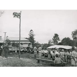 Boy scouts and cub scouts at a parade with scout leaders, Ipswich, 1950s