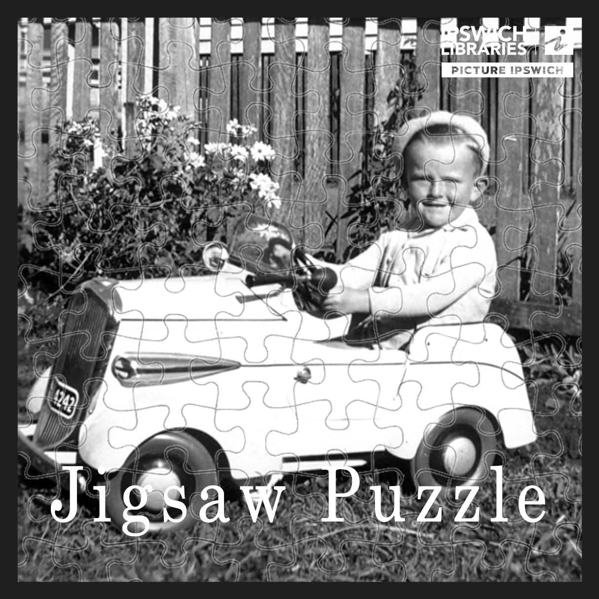 Child in toy car, Cothill Road, Booval, Ipswich, early 1950s (Jigsaw Puzzle)